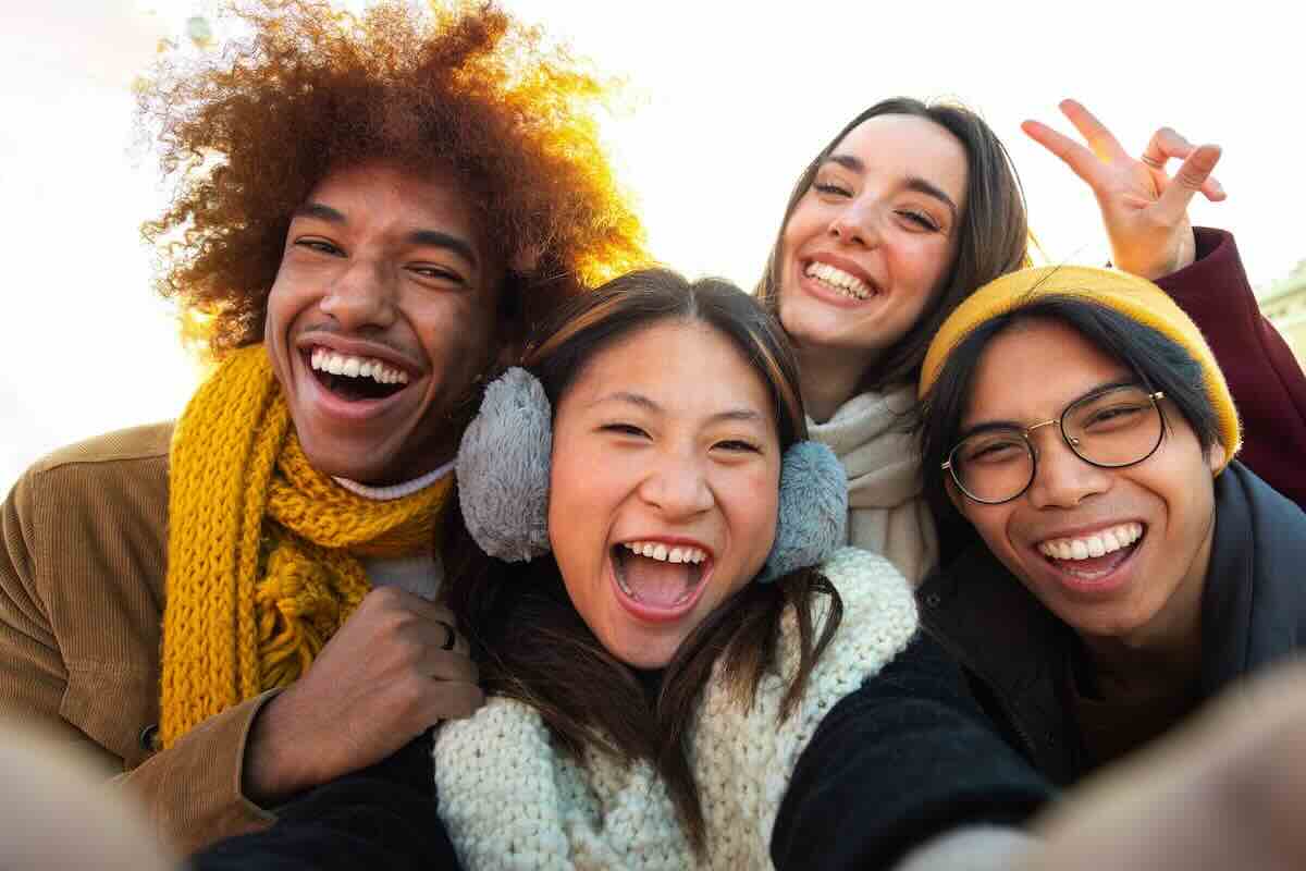Multicultural friends looking for free STI testing Metro East.