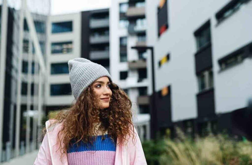 Woman wearing a beanie who found free STI testing Metro East.