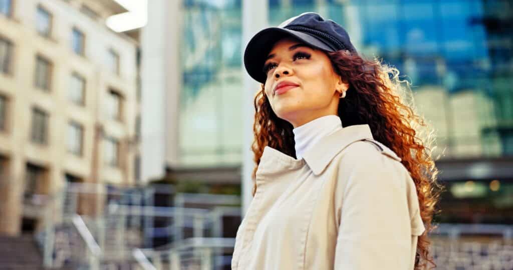 woman with curly hair and baseball cap looking at
free sti testing Metro East